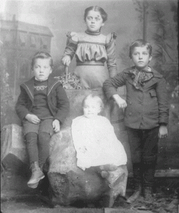 Jesse, Bertha, Ellen, and Edward Behe